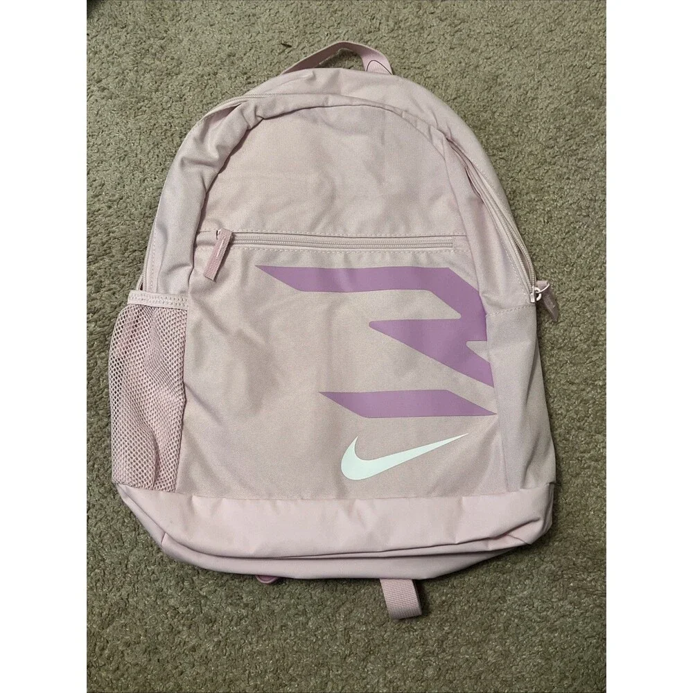 3 zipper nike backpack Brand Blitz Black 30L, 9AT048-023 | Padded 15 in sleeve, mesh organizer, side bottle pocket, 2 zip pockets. For boys, girls, men, women, gym, and travel Detachable mini bag allows you to keep small items organised. Nike 3BRAND By Russell Wilson